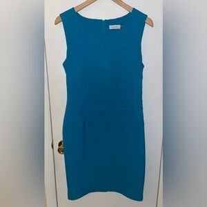 Calvin Klein blue dress.